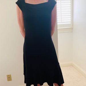 Black shirt sleeved dress.